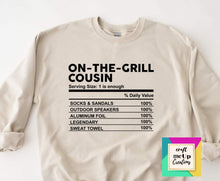 Load image into Gallery viewer, Cousin label on Natural long sleeve in Store
